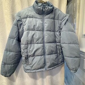 We wore what light Blue Puffer Jacket with removable sleeves
